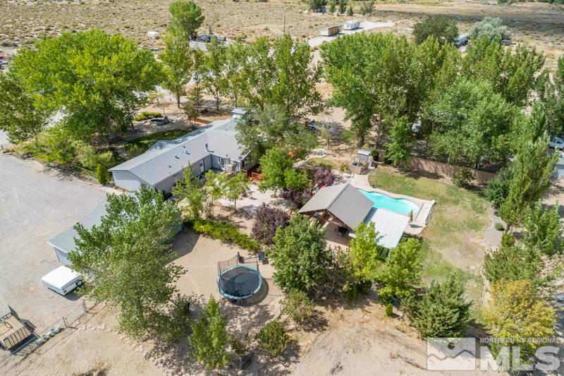 4989 Cody Road Fallon, NV 89406 - Photo 33 of 39 an aerial view of a house with a yard