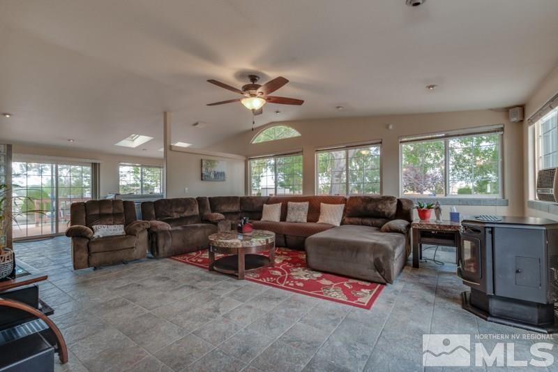 4989 Cody Road Fallon, NV 89406 - Photo 8 of 39 a living room with lots of furniture and a large window