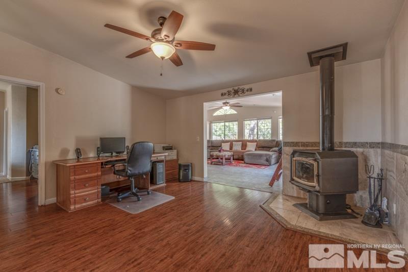 4989 Cody Road Fallon, NV 89406 - Photo 10 of 39 a work room with furniture and a floor to ceiling window
