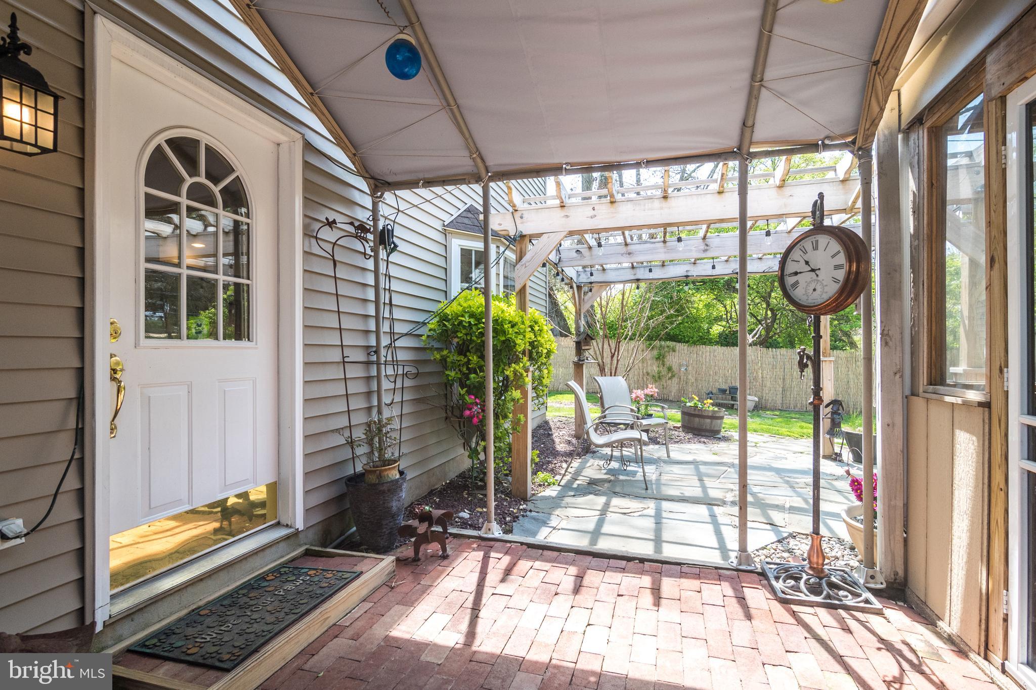 407 Norfolk Road Flourtown, PA 19031 - Photo 41 of 47 Back Entry to the Great Room/Patios