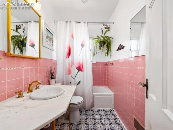 a bathroom with a sink and toilet