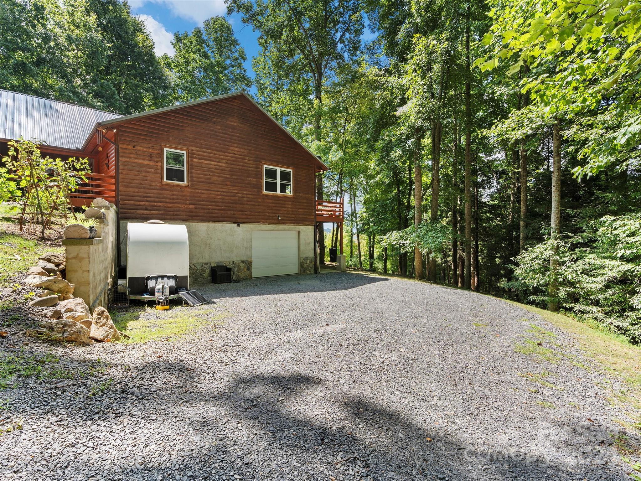 25 Dawn Valley Road Waynesville, NC 28785 - Photo 34 of 46 a house view with a backyard space