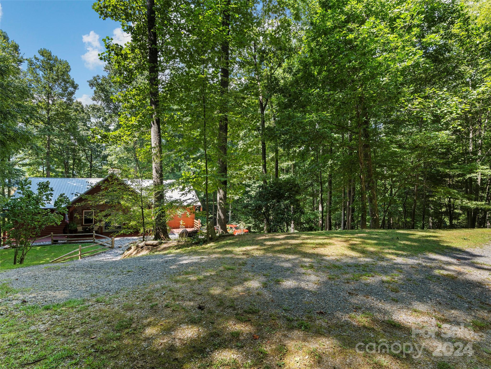 25 Dawn Valley Road Waynesville, NC 28785 - Photo 38 of 46 a view of outdoor space with trees all around