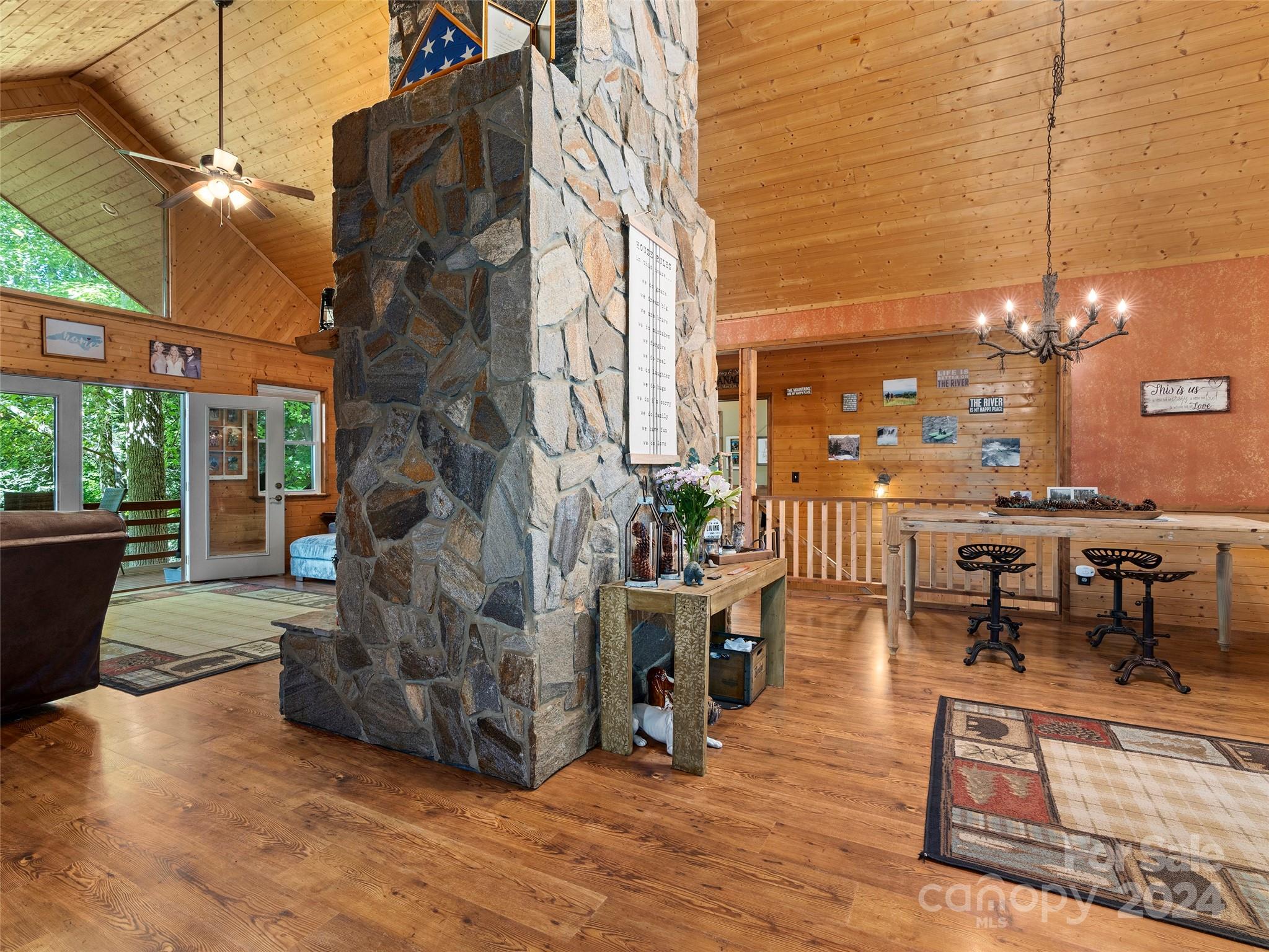25 Dawn Valley Road Waynesville, NC 28785 - Photo 9 of 46 a view of a patio with dining table and chairs