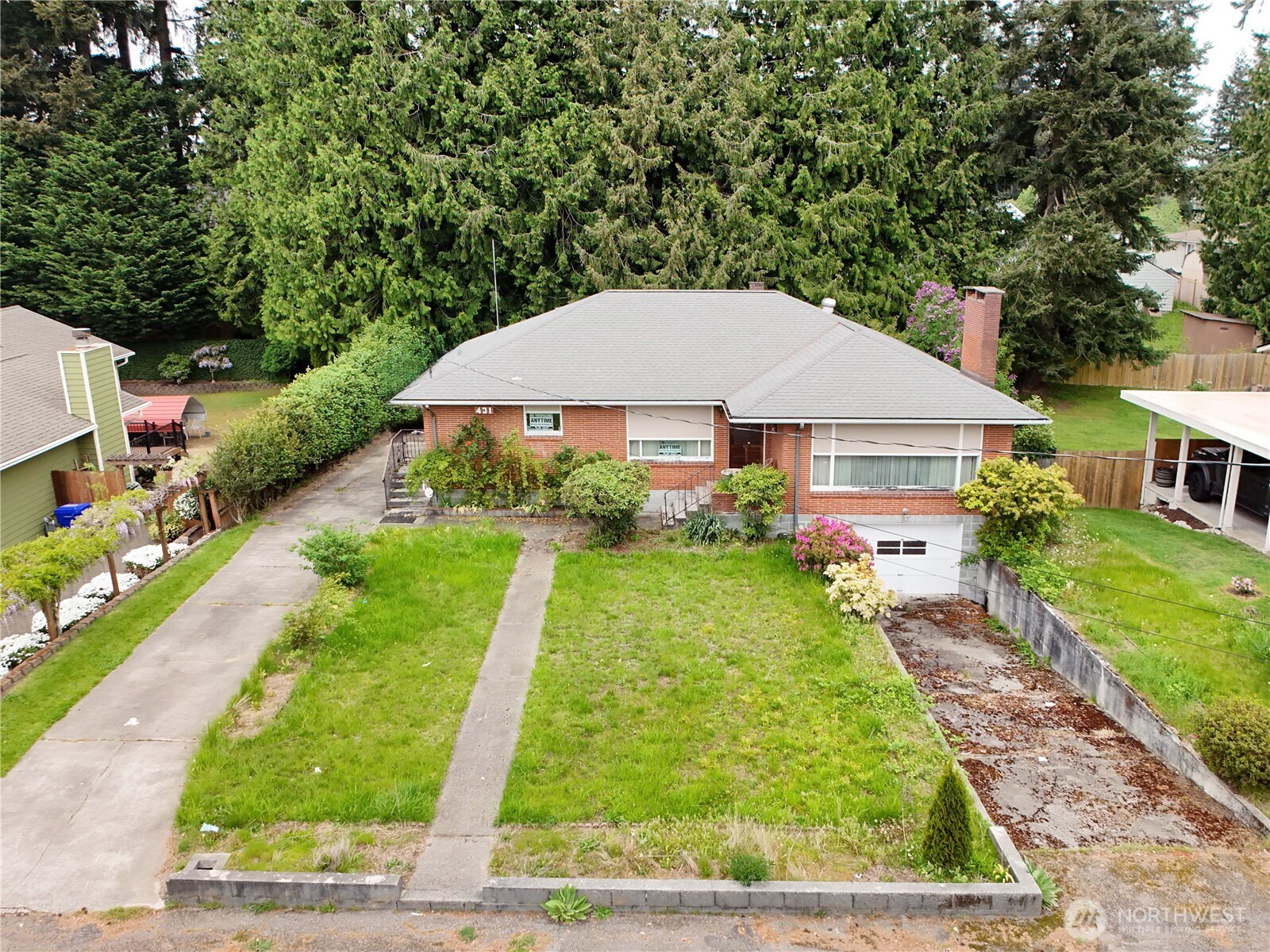 431 72nd Street Southeast Everett, WA 98203 - Photo 1 of 14 a view of backyard of house with green space