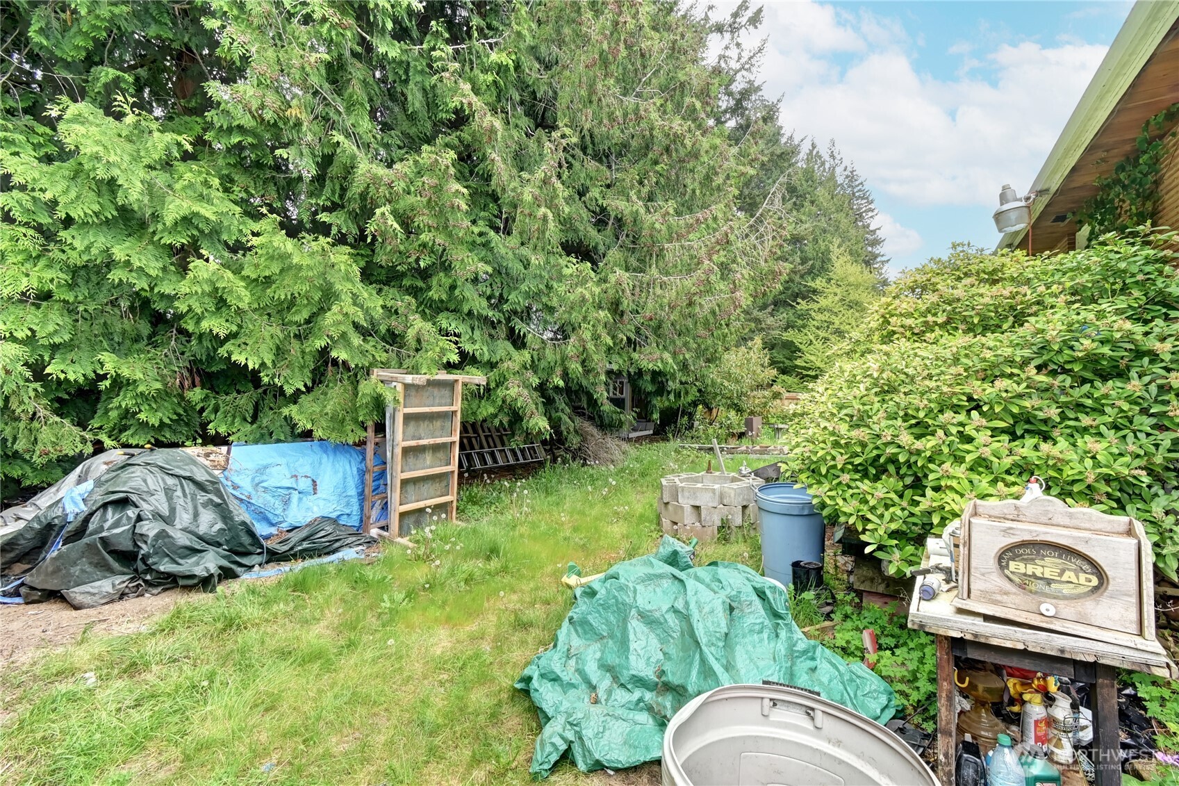 431 72nd Street Southeast Everett, WA 98203 - Photo 11 of 14 a backyard of a house with table and chairs