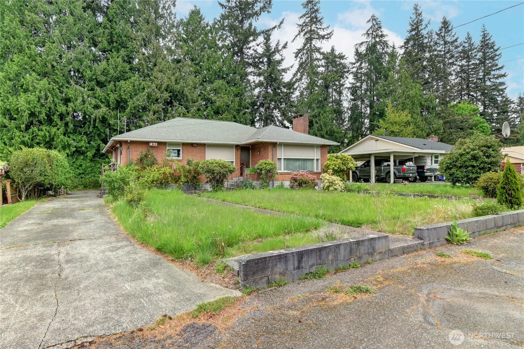 431 72nd Street Southeast Everett, WA 98203 - Photo 6 of 14 a front view of a house with a yard