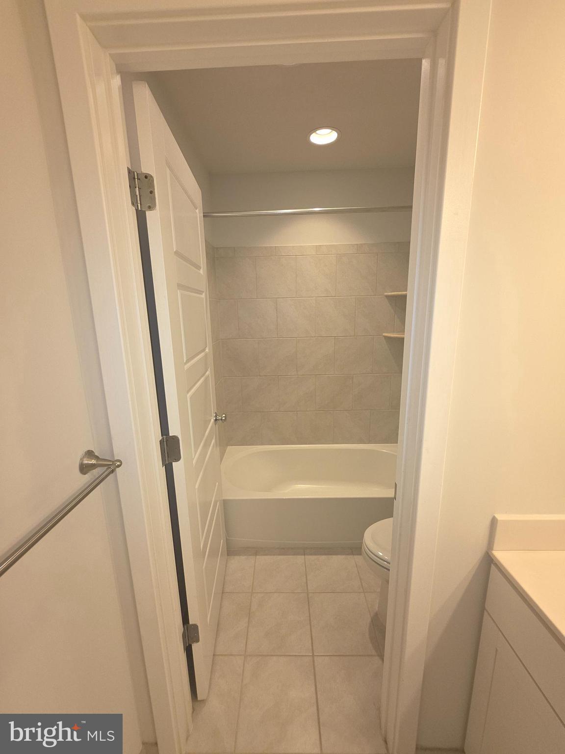 12709 Vuillard Street Silver Spring, MD 20906 - Photo 17 of 28 a bathroom with a bathtub