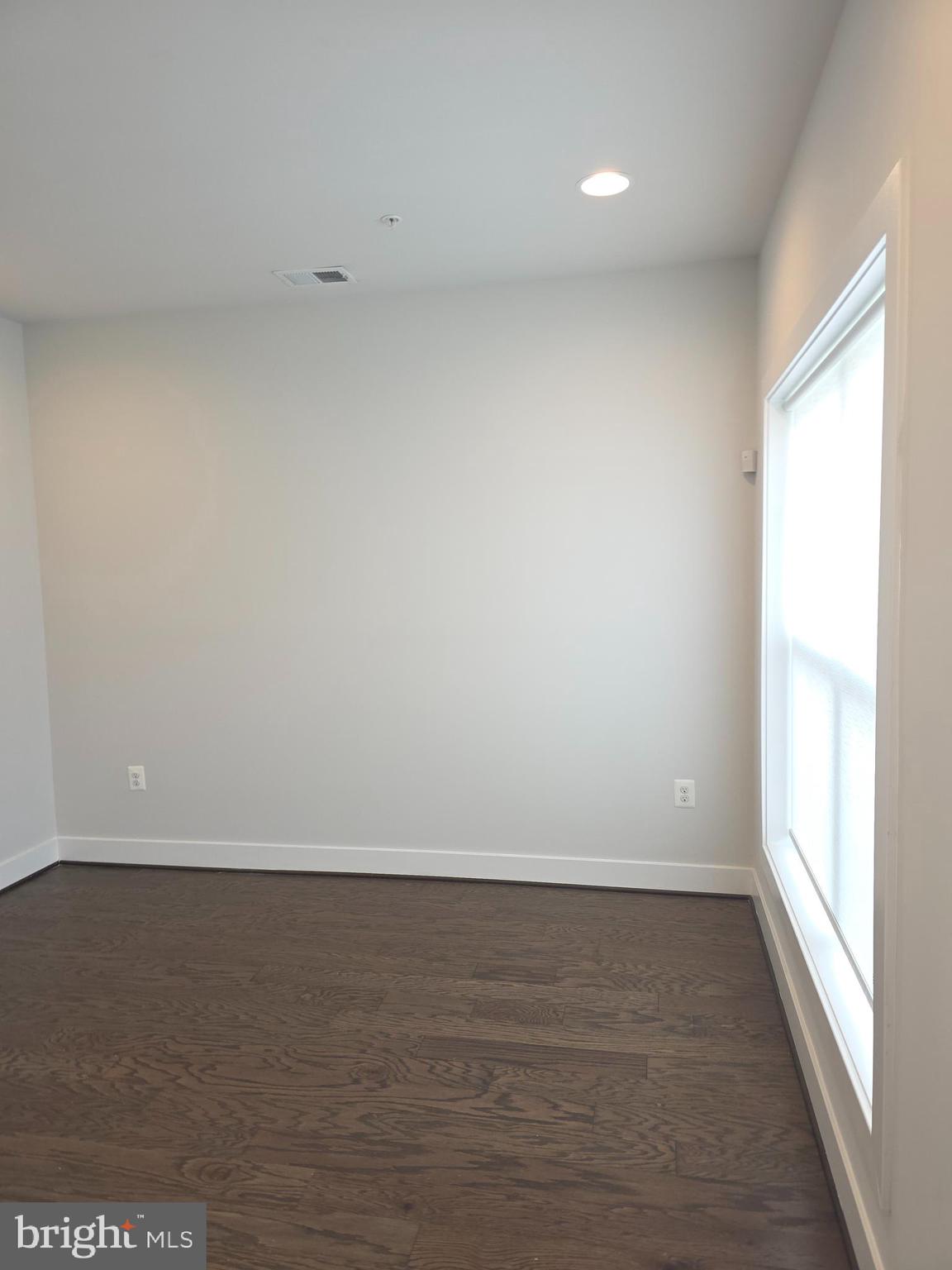 12709 Vuillard Street Silver Spring, MD 20906 - Photo 25 of 28 a view of an empty room and window
