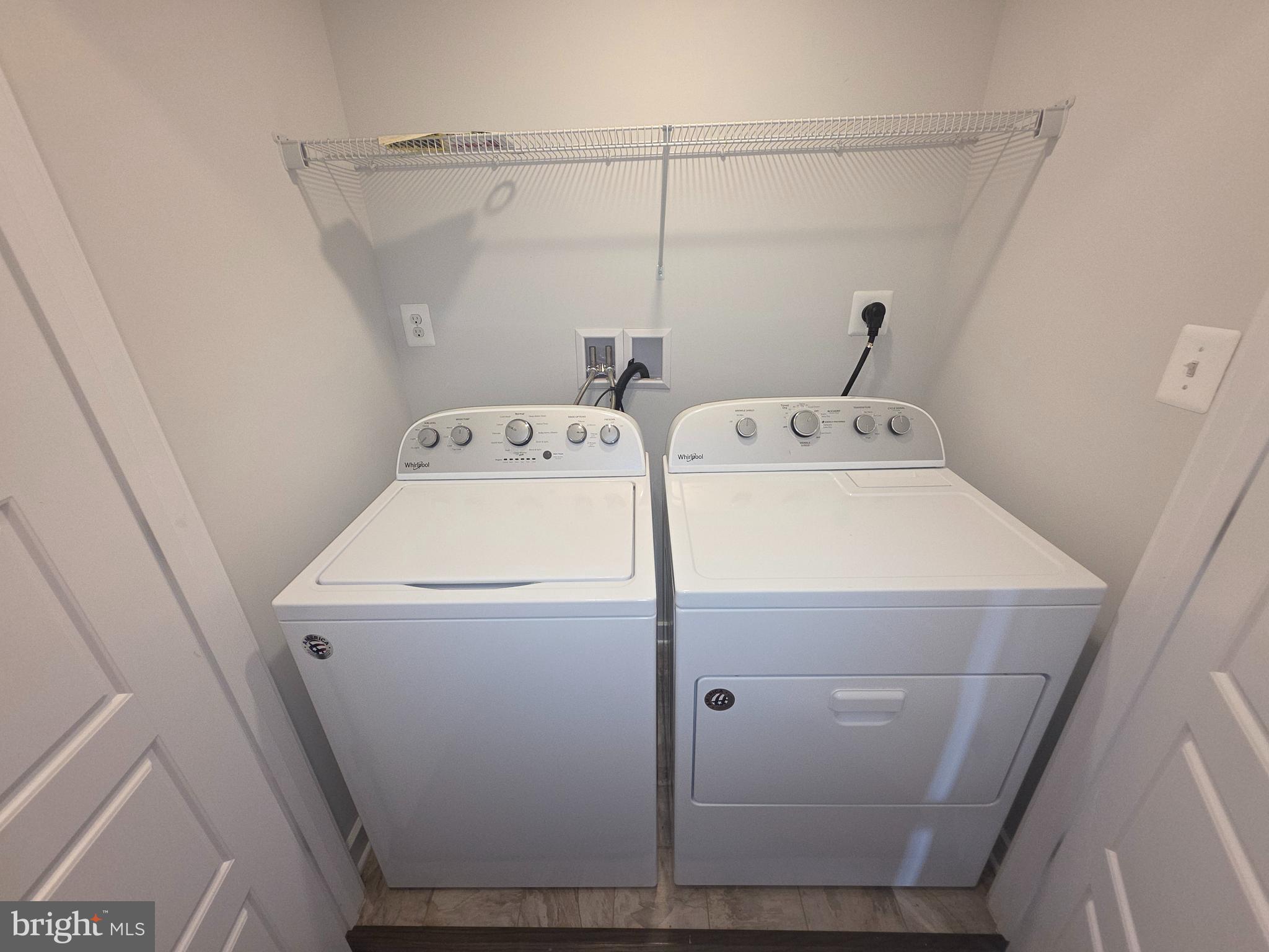 12709 Vuillard Street Silver Spring, MD 20906 - Photo 9 of 28 a utility room with dryer and washer