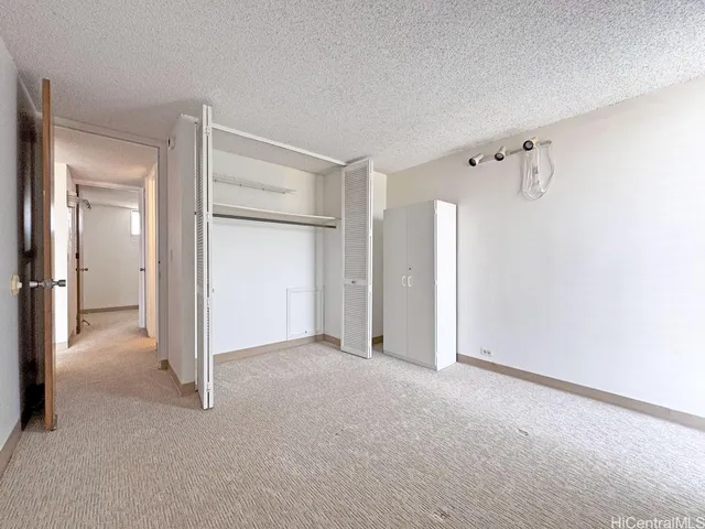 a view of a room with an empty space