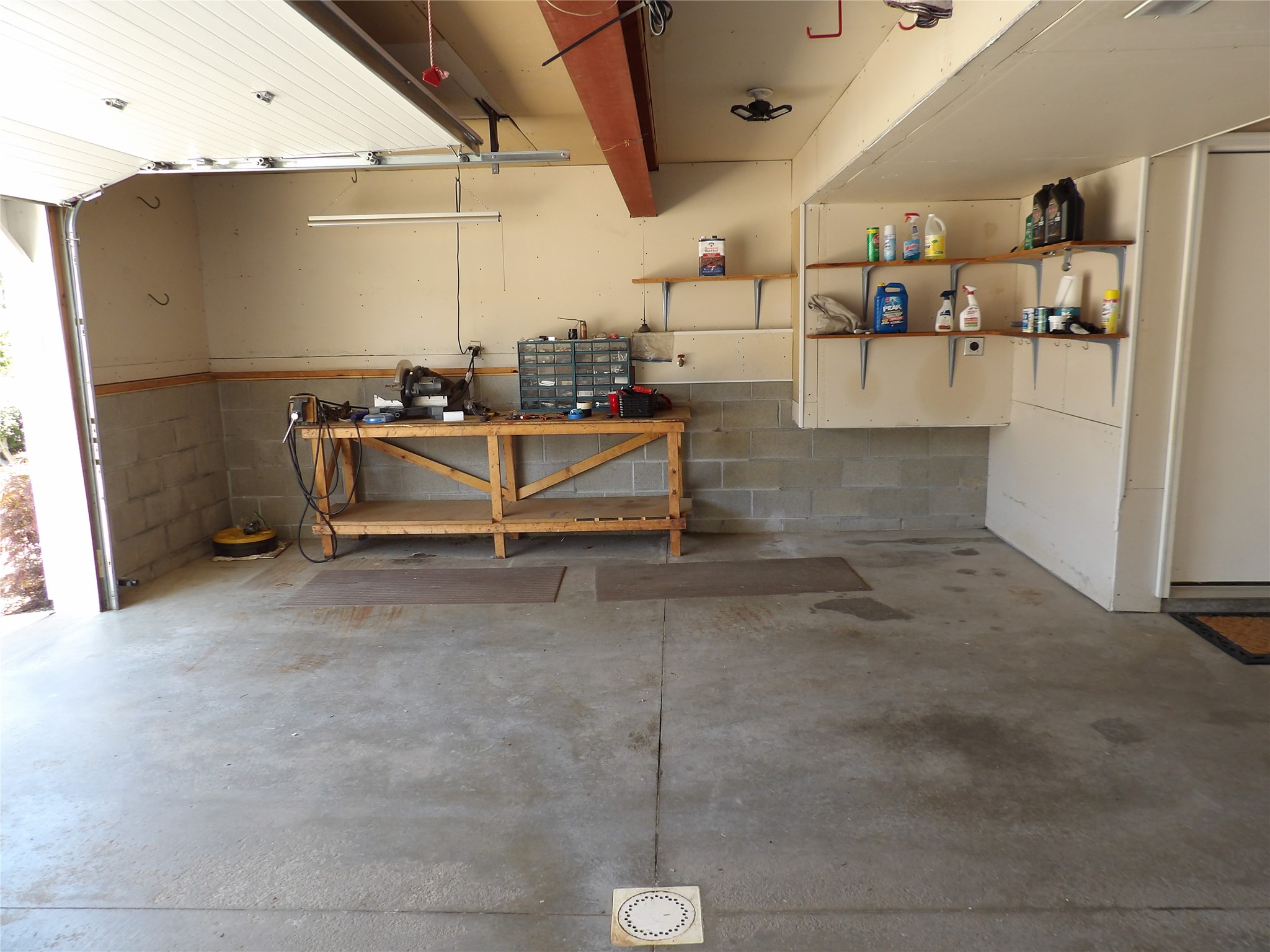 5213 La Rae Drive Erie, PA 16506 - Photo 45 of 46 Oversized 2 car garage with room for lawn equipment and work bench.