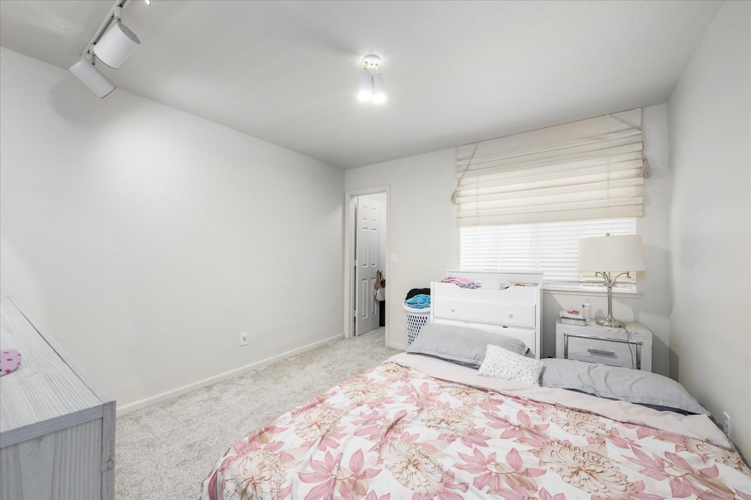 5636 Darby Road Rocklin, CA 95765 - Photo 20 of 29 a room with a bed and a large window