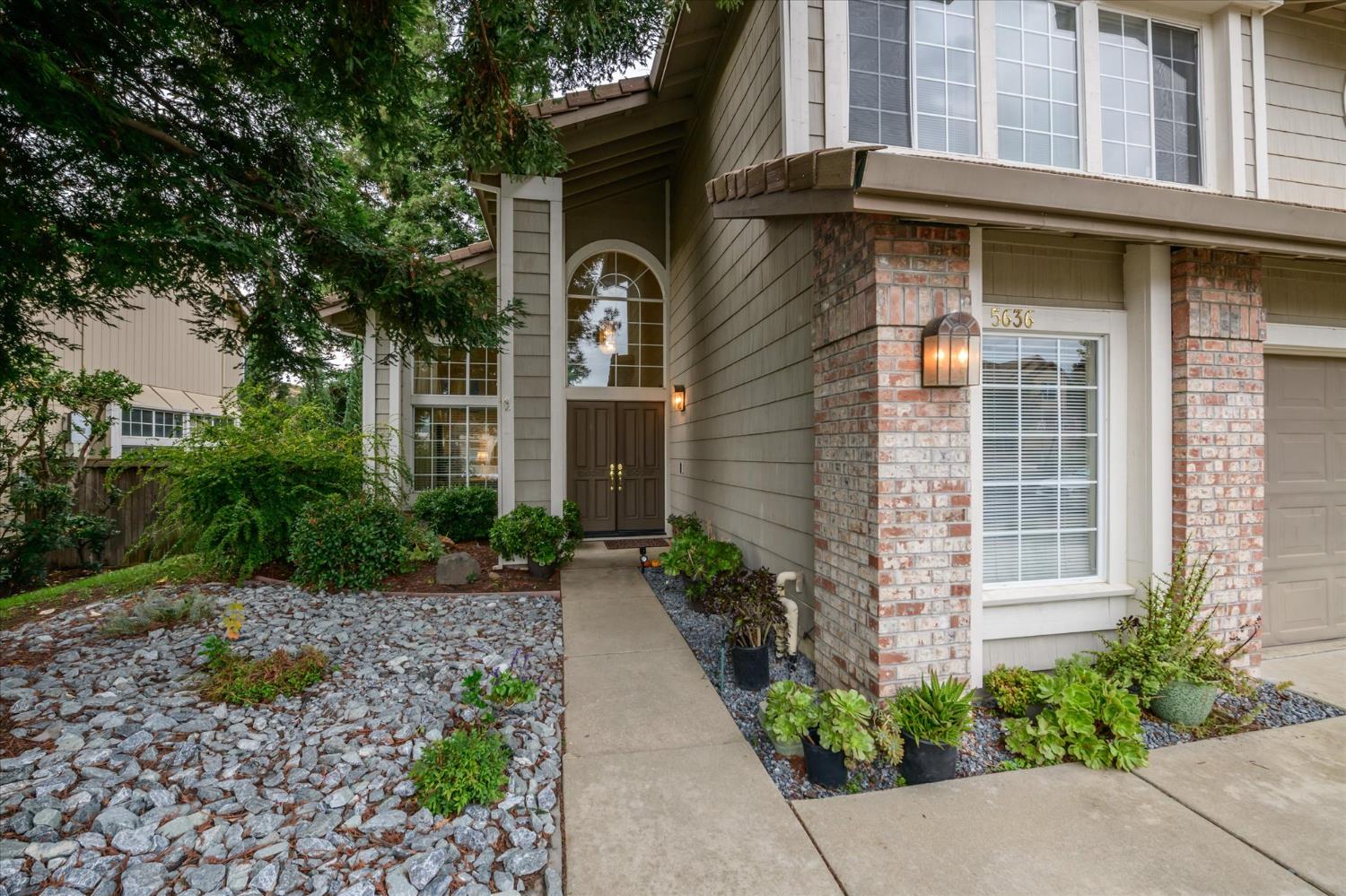 5636 Darby Road Rocklin, CA 95765 - Photo 2 of 29 a front view of a house with garden