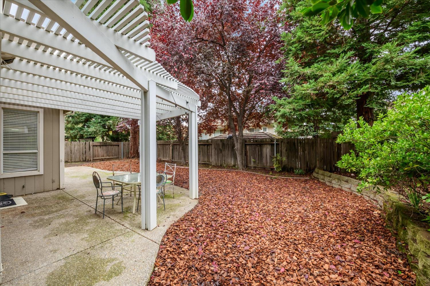 5636 Darby Road Rocklin, CA 95765 - Photo 24 of 29 a view of a house with backyard and sitting area