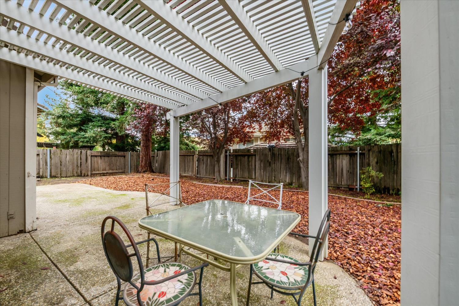 5636 Darby Road Rocklin, CA 95765 - Photo 25 of 29 a patio with glass top table and chairs