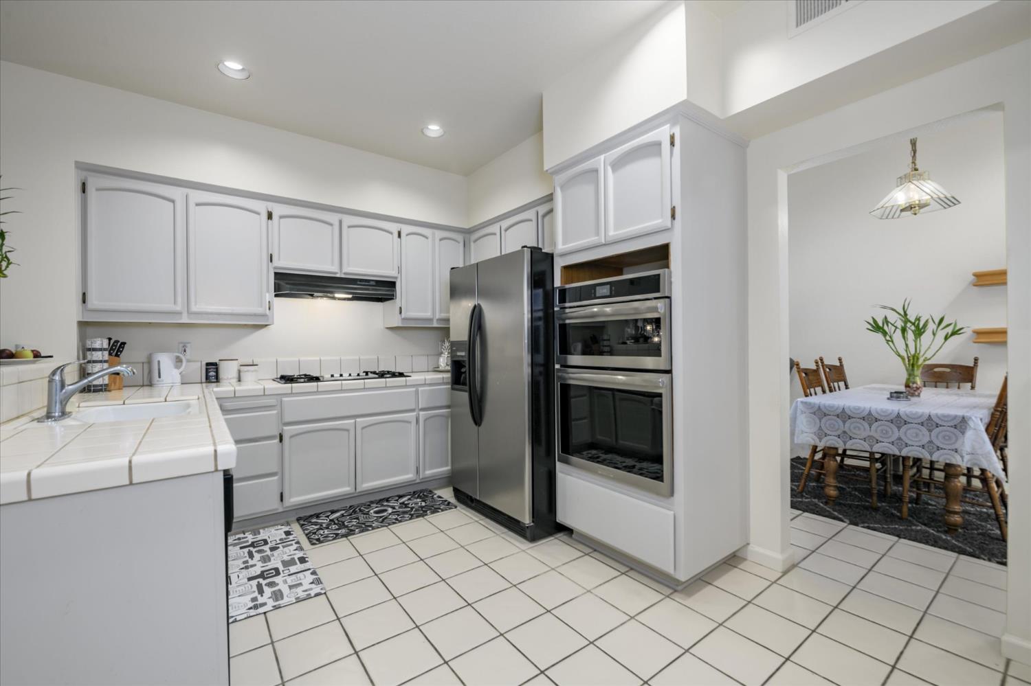 5636 Darby Road Rocklin, CA 95765 - Photo 6 of 29 a kitchen with a cabinets and appliances