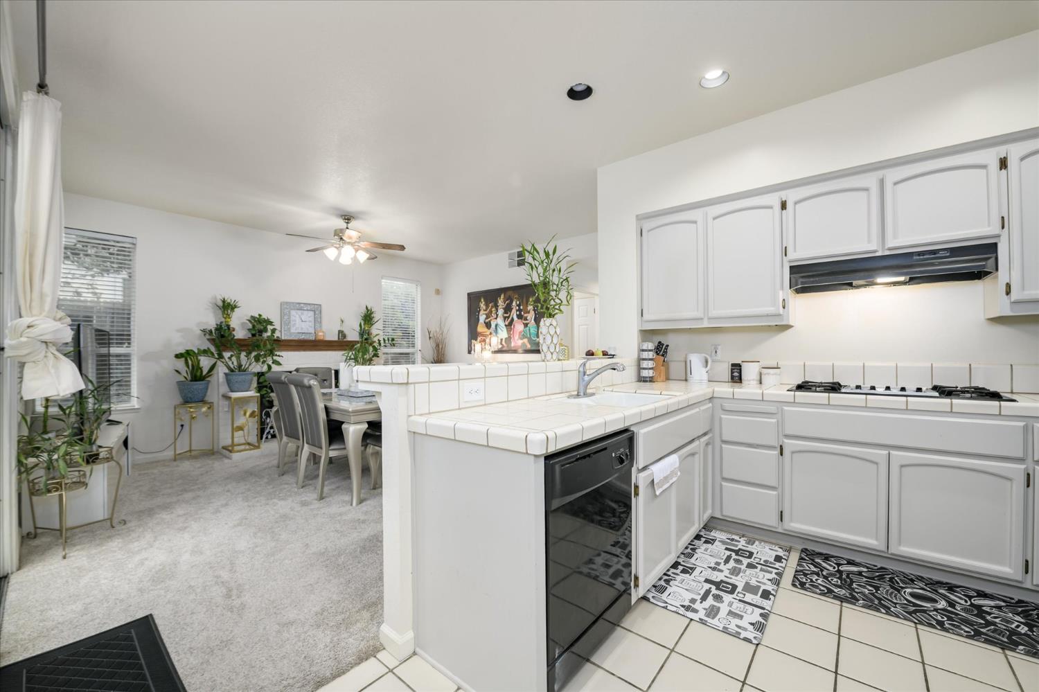 5636 Darby Road Rocklin, CA 95765 - Photo 7 of 29 a kitchen with a sink and cabinets
