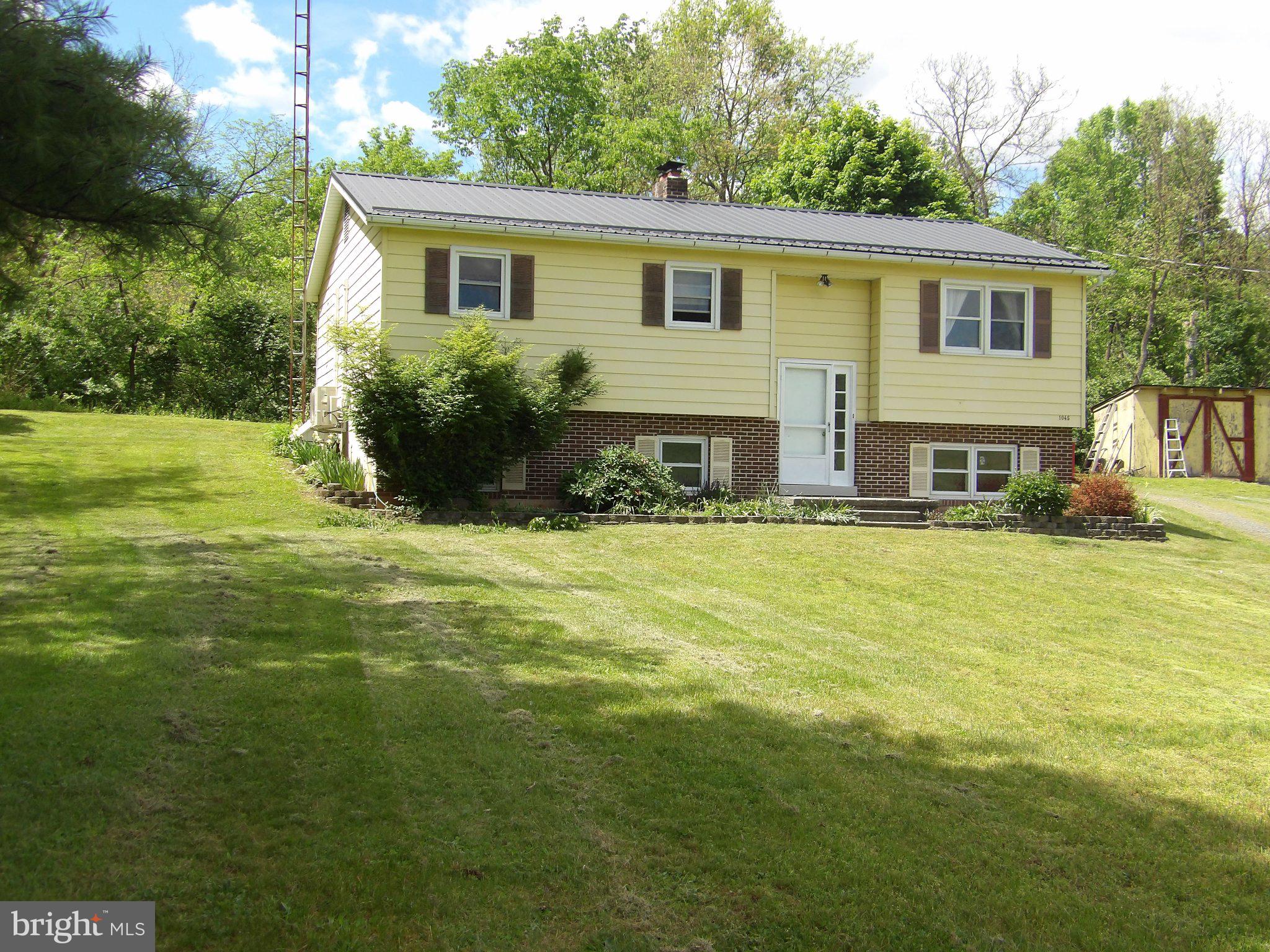 1045 Lockport Road Lewistown, PA 17044 - Photo 23 of 51 Charming split-level home on lush lawn.