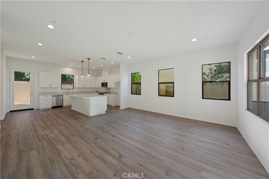 810 Francesca Drive Walnut, CA 91789 - Photo 21 of 33 a view of a kitchen with wooden floor and windows