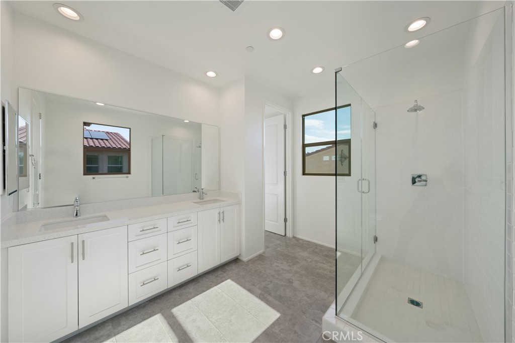 810 Francesca Drive Walnut, CA 91789 - Photo 8 of 33 a bathroom with a double vanity sink toilet and shower