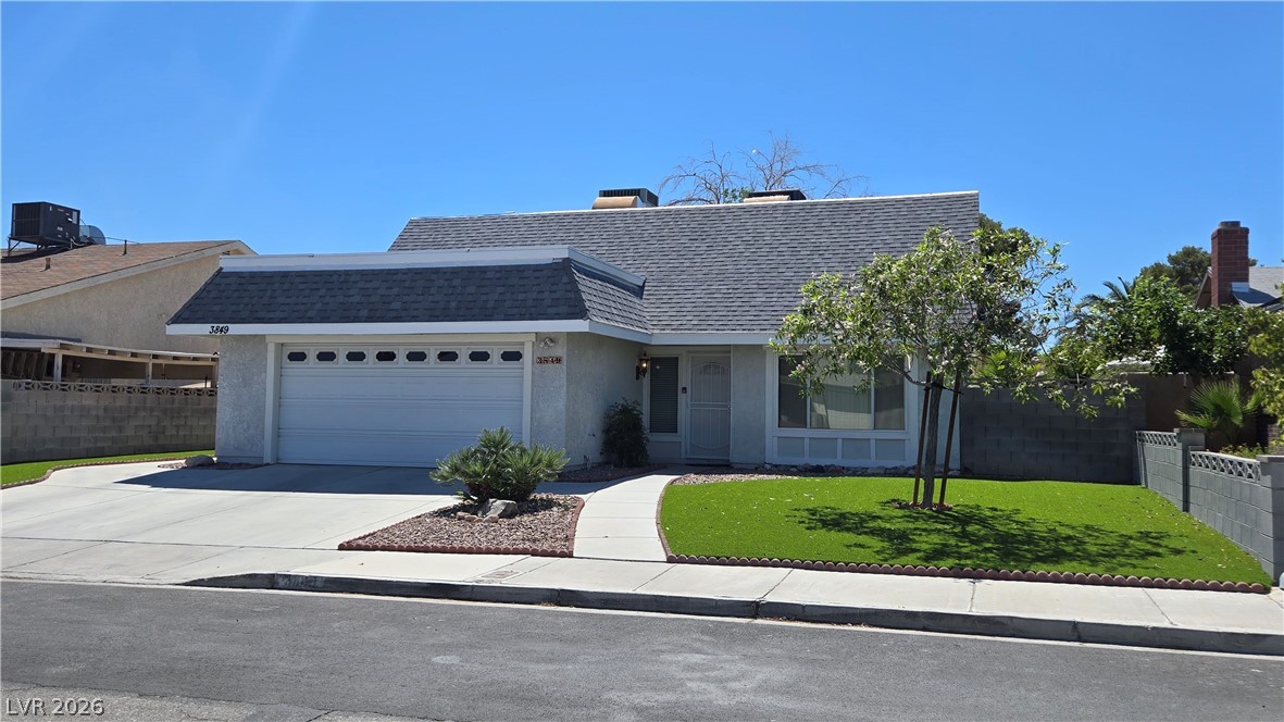 3849 Reflection Way Las Vegas, NV 89147 - Photo 2 of 25 This appealing single-story residence showcases a well-maintained facade and welcoming landscaping.