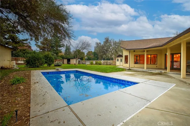 a view of outdoor space yard swimming pool and barbeque oven