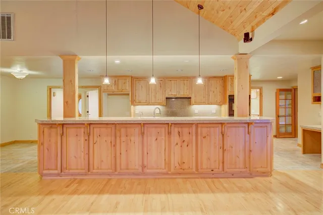 a view of a kitchen with a sink