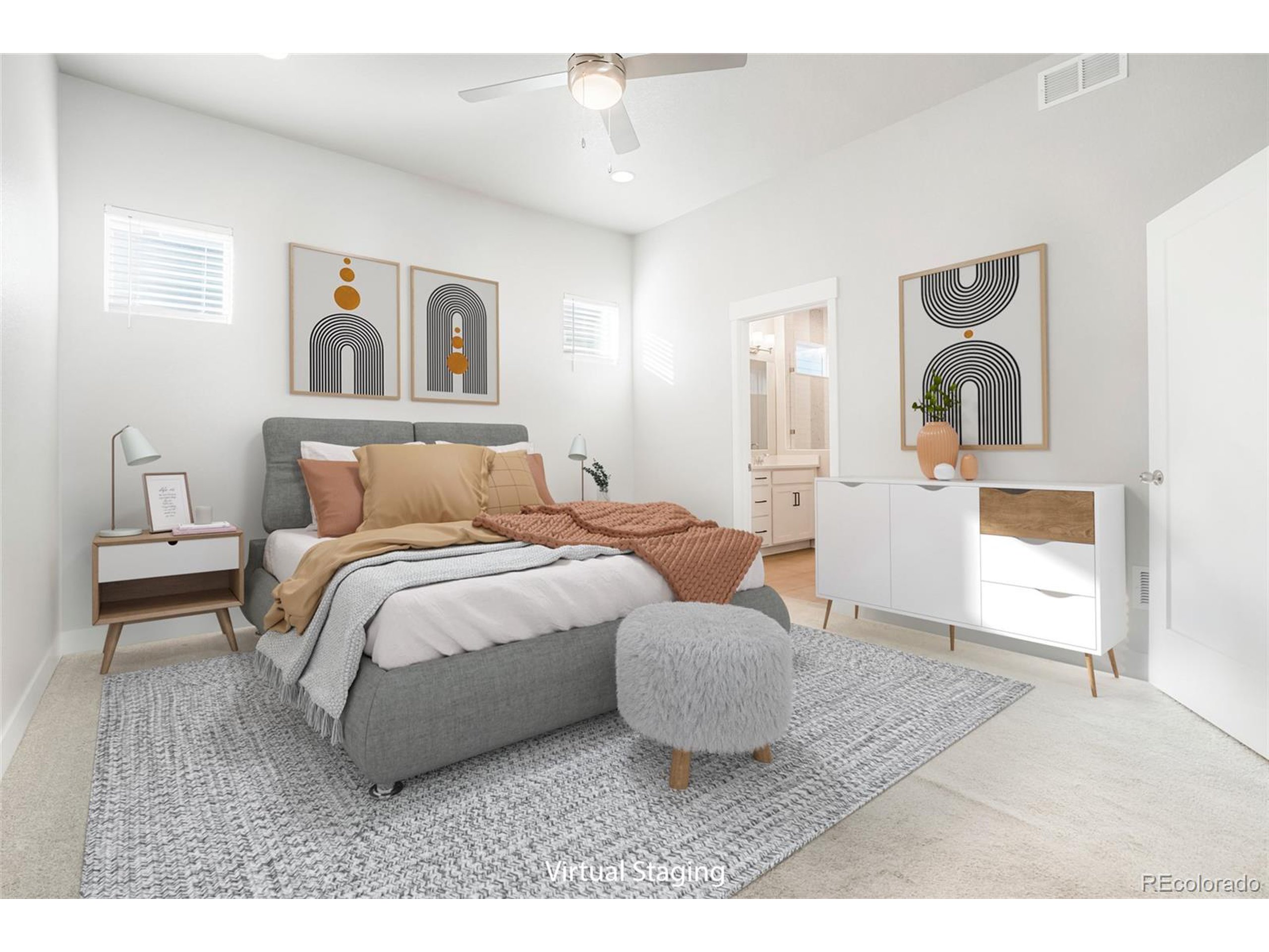 20968 East 60th Place Aurora, CO 80019 - Photo 20 of 50 a bedroom with a bed and a painting on the wall