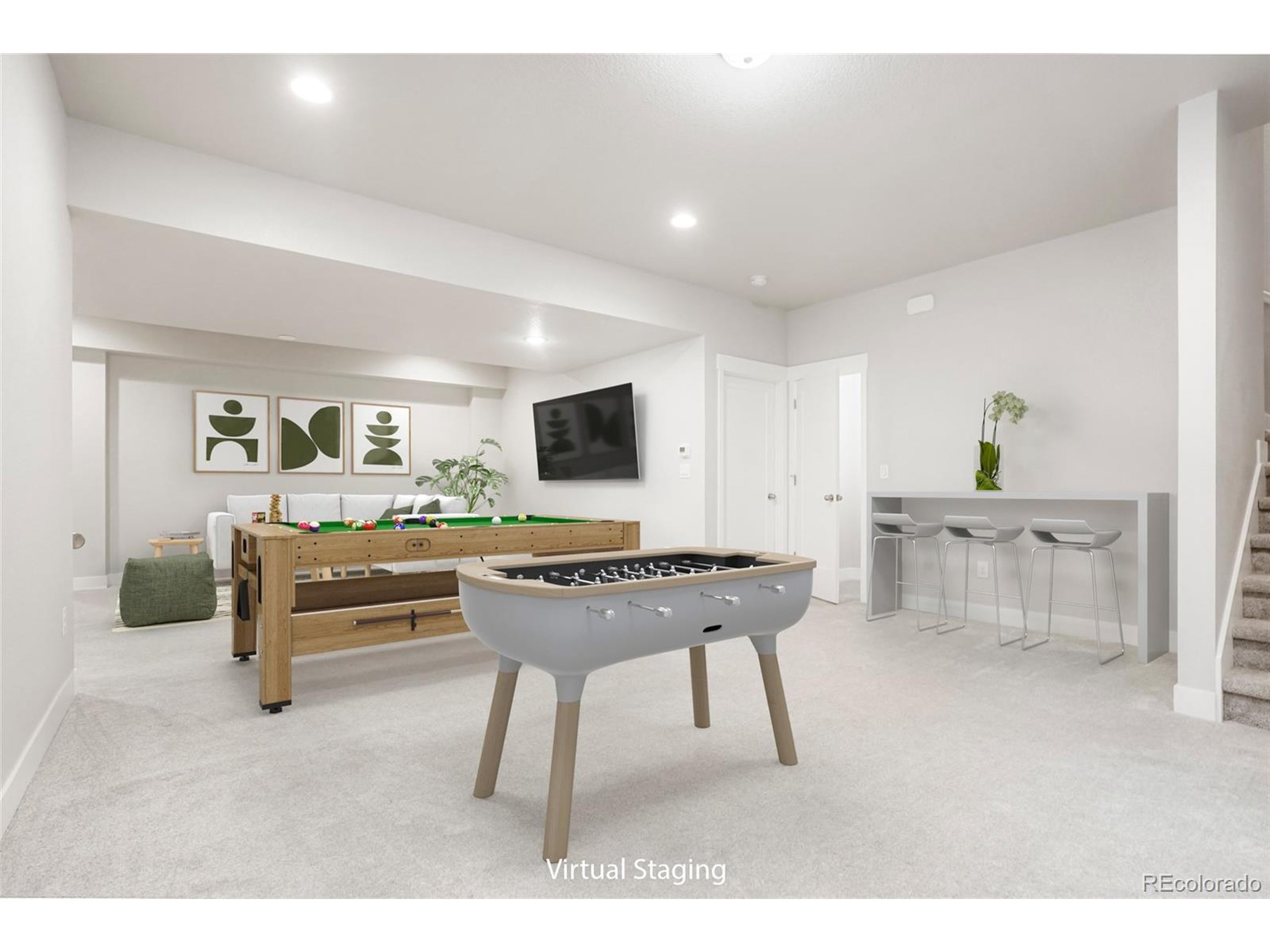 20968 East 60th Place Aurora, CO 80019 - Photo 28 of 50 a living room with furniture a wooden floor and a flat screen tv
