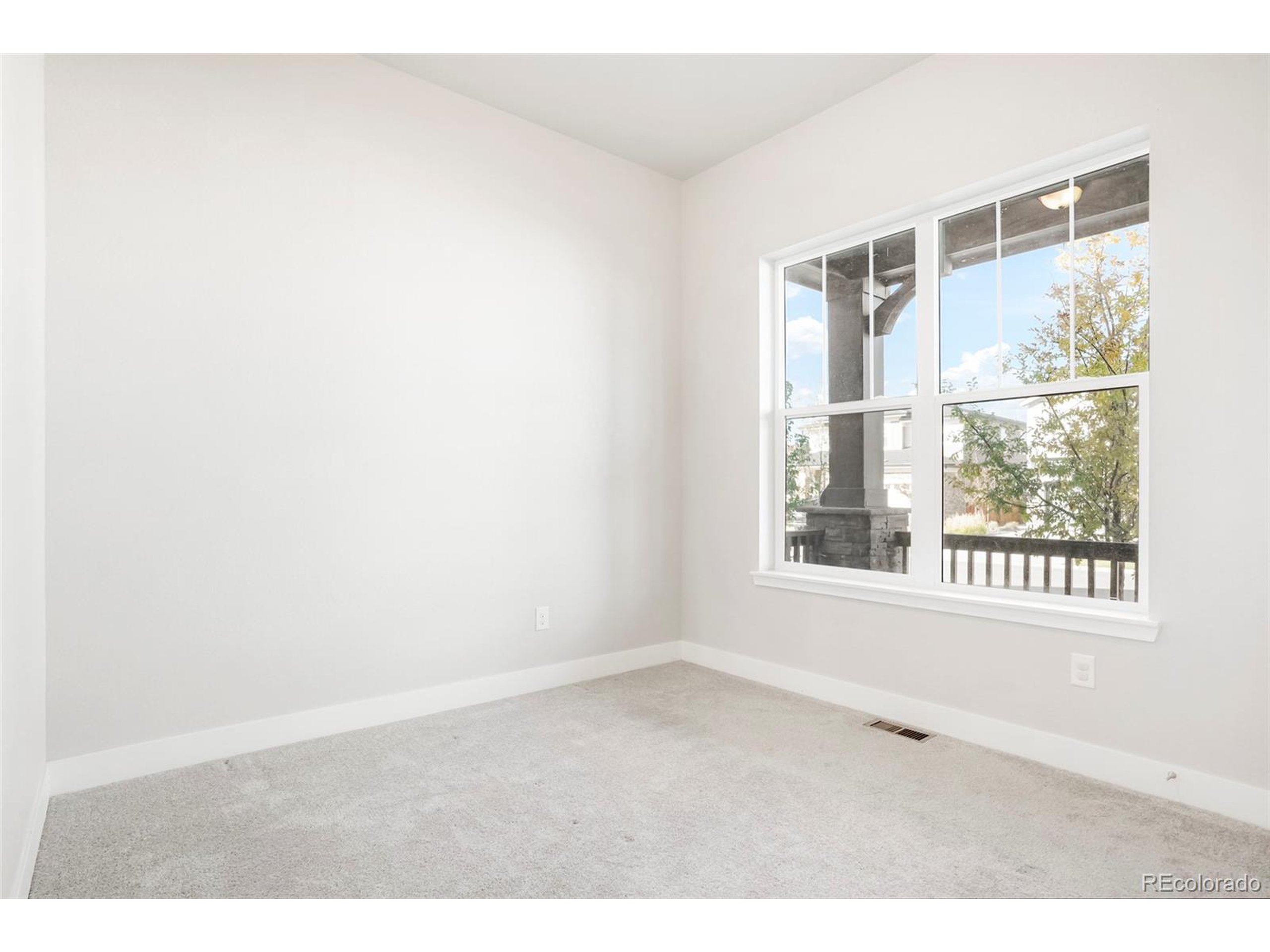 20968 East 60th Place Aurora, CO 80019 - Photo 41 of 50 an empty room with a window