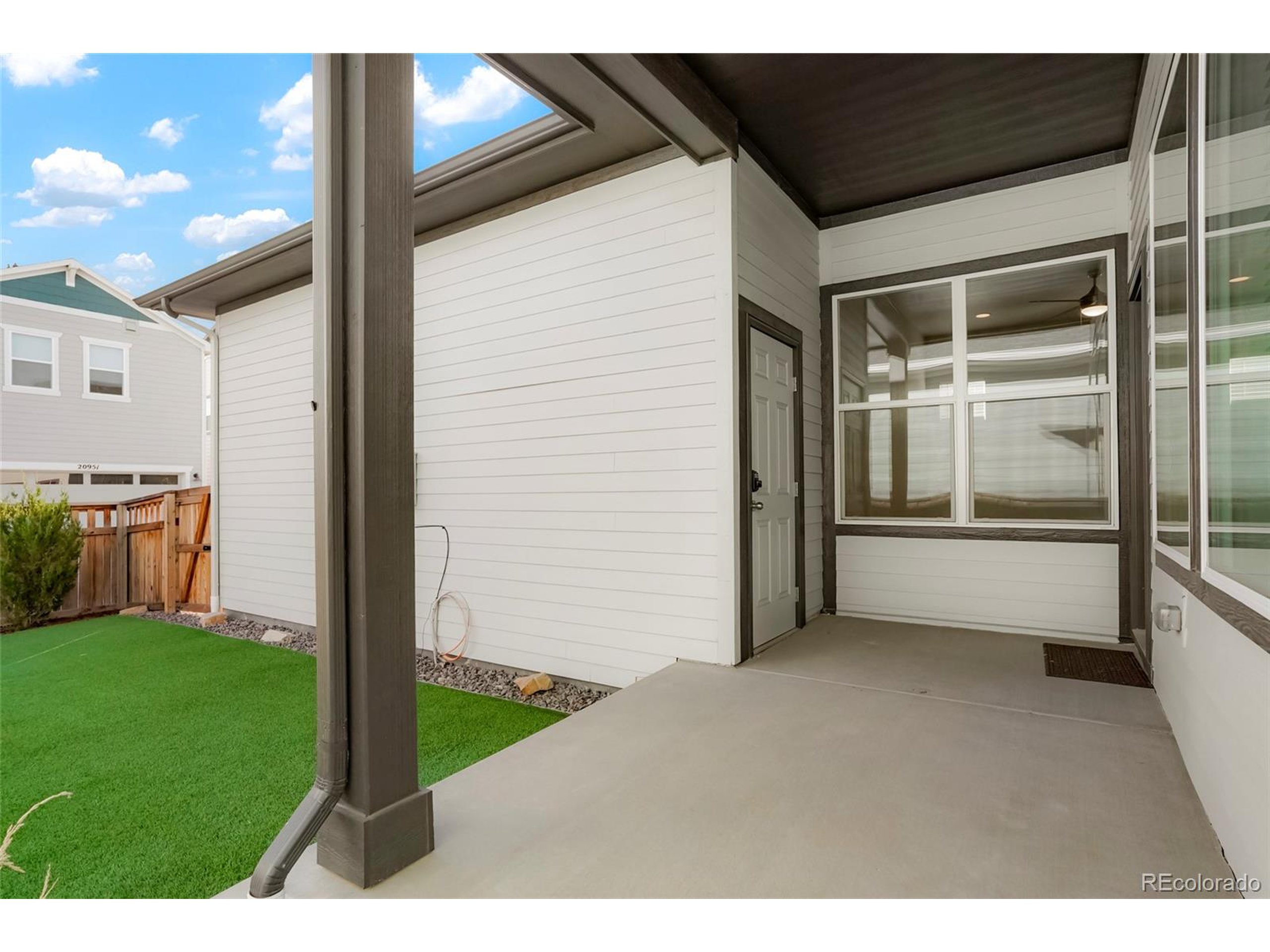20968 East 60th Place Aurora, CO 80019 - Photo 43 of 50 a view of an front door