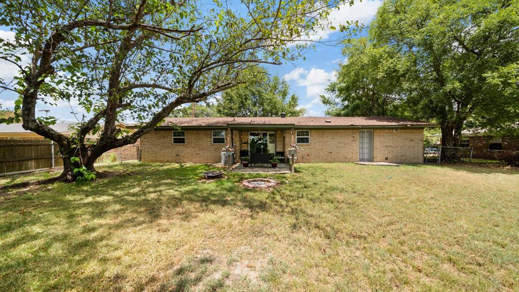 230 Dodson Street Canton, TX 75103 - Photo 17 of 17 a view of a house with a yard and large tree