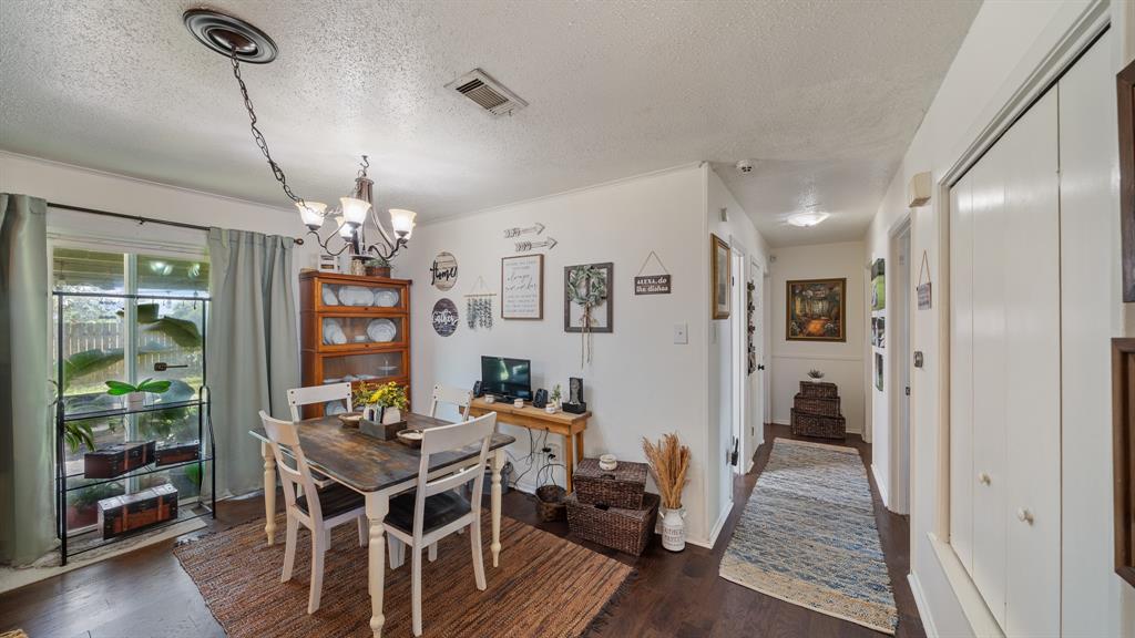 230 Dodson Street Canton, TX 75103 - Photo 6 of 17 a view of a dining room with furniture and wooden floor