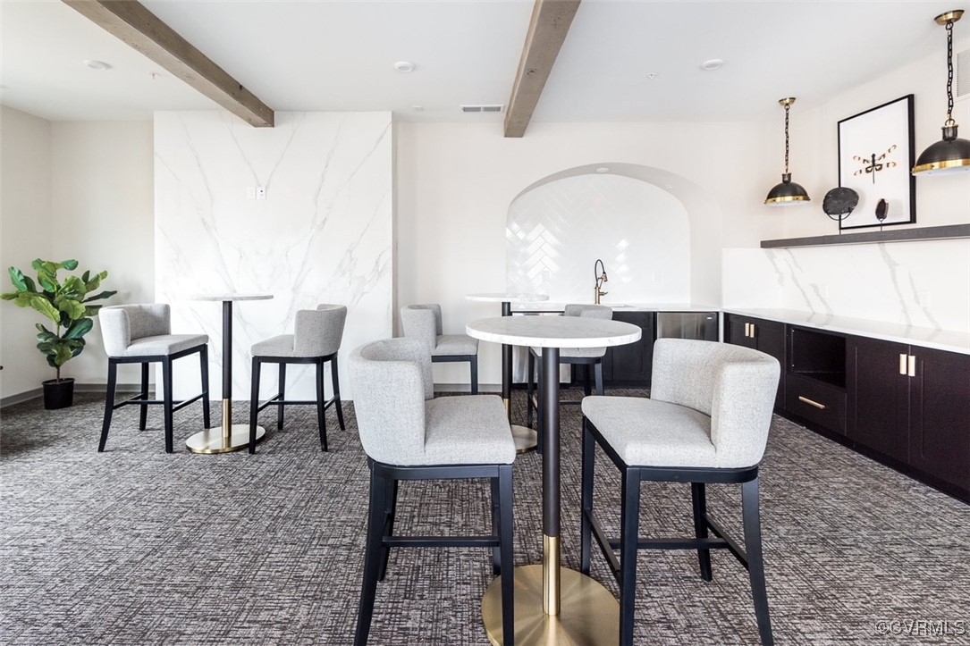 7304 Hancock Towns Lane, Unit A4 Chesterfield, VA 23832 - Photo 18 of 20 a view of a dining room with furniture
