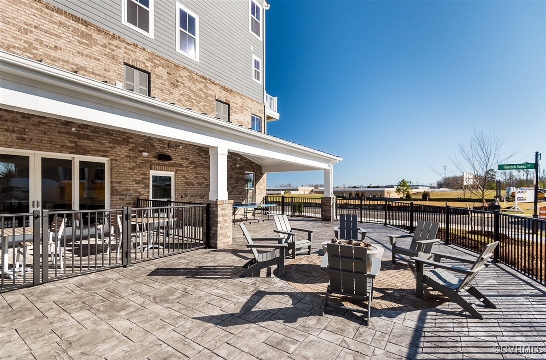 7304 Hancock Towns Lane, Unit A4 Chesterfield, VA 23832 - Photo 20 of 20 a view of a patio with table and chairs