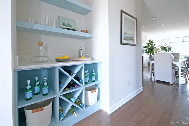 a view of an entryway with wooden floor