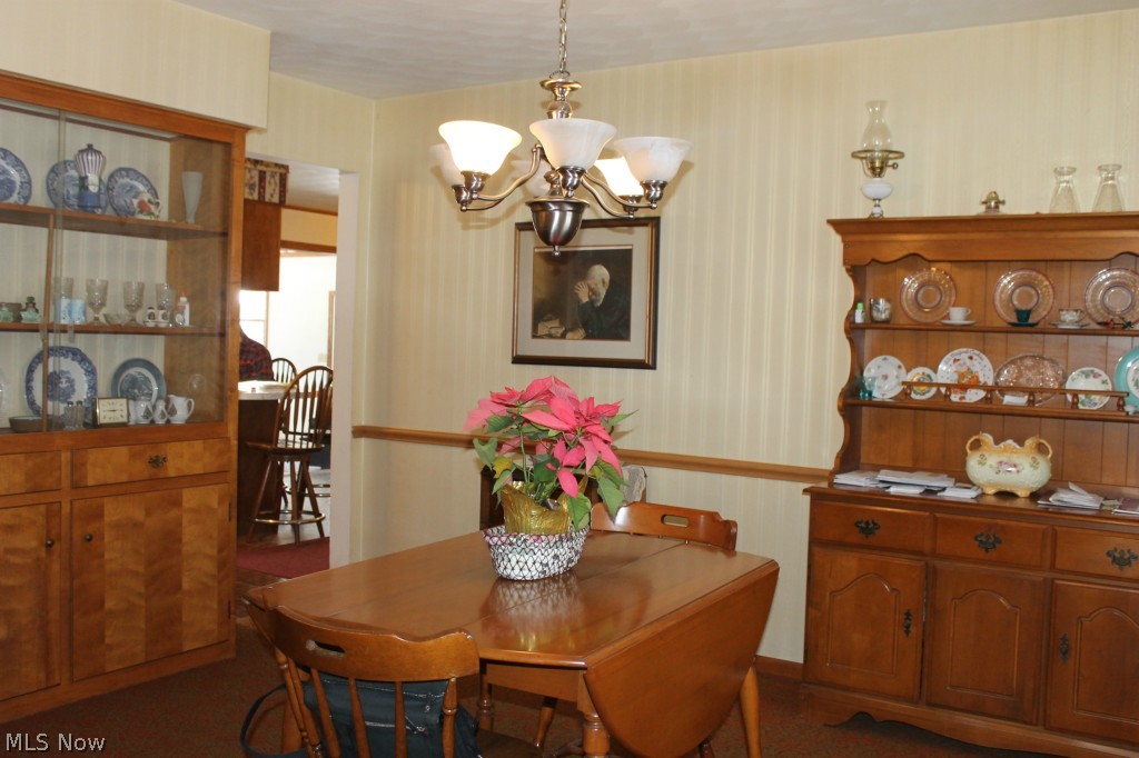 1999 Porter Road Atwater, OH 44201 - Photo 15 of 24 Another view of the dining room. Custom built-in hutch on the left!