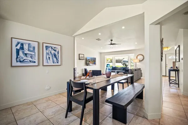 a view of a dining room with furniture