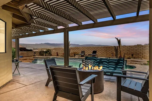 a view of a terrace with outdoor seating