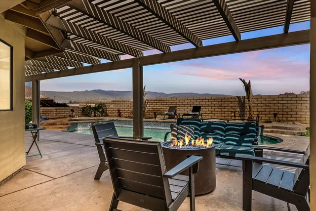 a view of a terrace with outdoor seating
