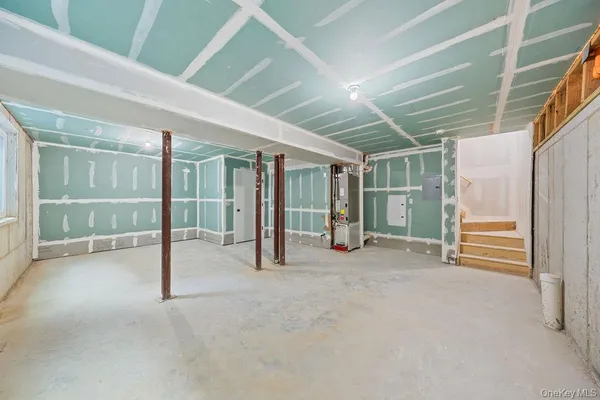 a view of an empty room with glass door