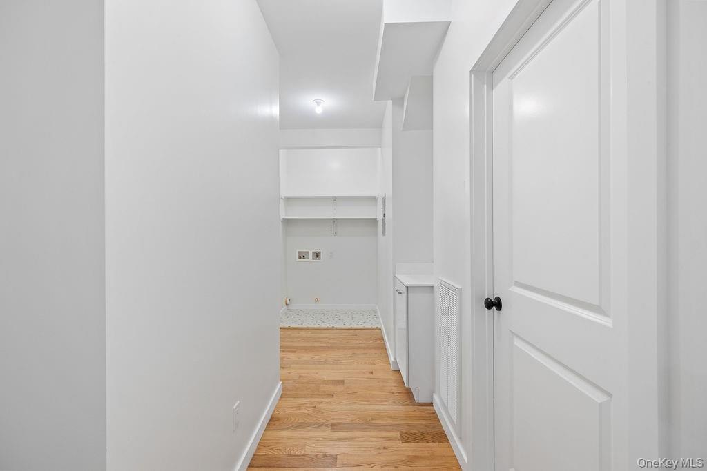 472 West Central Avenue, Unit 105 Spring Valley, NY 10977 - Photo 9 of 22 a view of a bathroom from the hallway