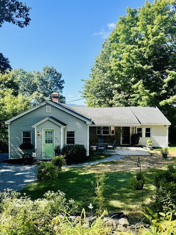 452 Hollis Road Lunenburg, MA 01462 - Photo 1 of 25 a front view of house with yard and green space