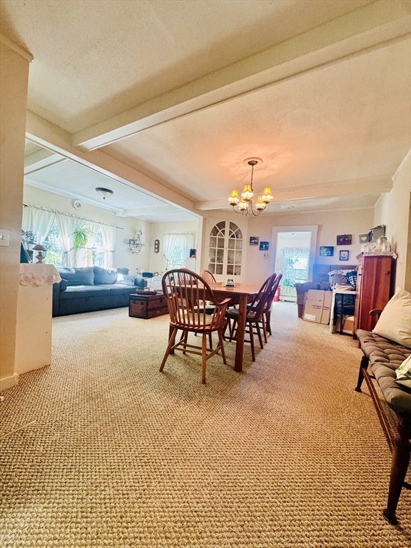 452 Hollis Road Lunenburg, MA 01462 - Photo 12 of 25 a view of a dining room with furniture