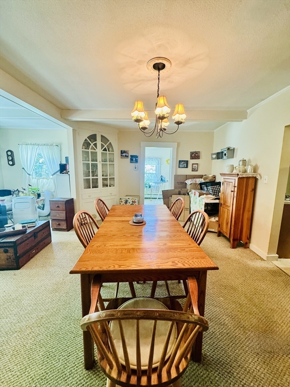 452 Hollis Road Lunenburg, MA 01462 - Photo 13 of 25 a view of a dining room with furniture