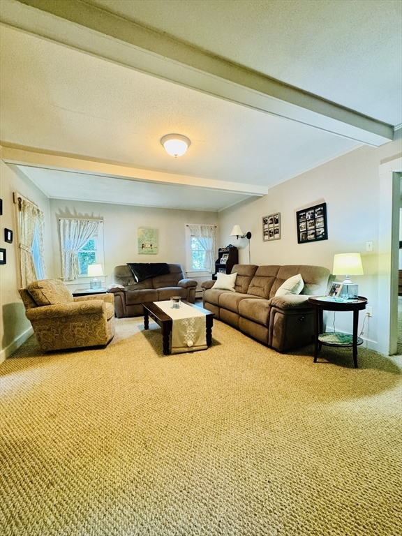 452 Hollis Road Lunenburg, MA 01462 - Photo 10 of 25 a living room with furniture