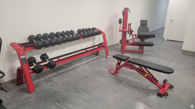 2101 North Main Street, Unit 309 Sunset, UT 84015 - Photo 16 of 17 Exercise area featuring finished concrete flooring and baseboards