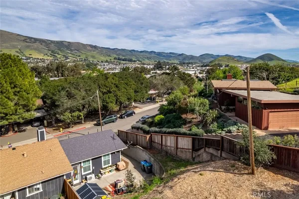 an aerial view of a house with a garden
