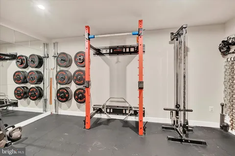 a view of a house with wooden deck
